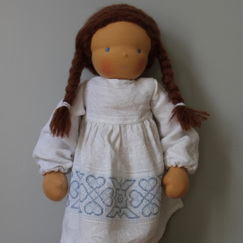 Waldorf doll girl in white embroidered dress, brown hair, made by feinslieb