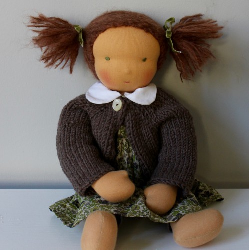 Waldorf doll girl in greenish liberty dresss, brown hair, made by feinslieb